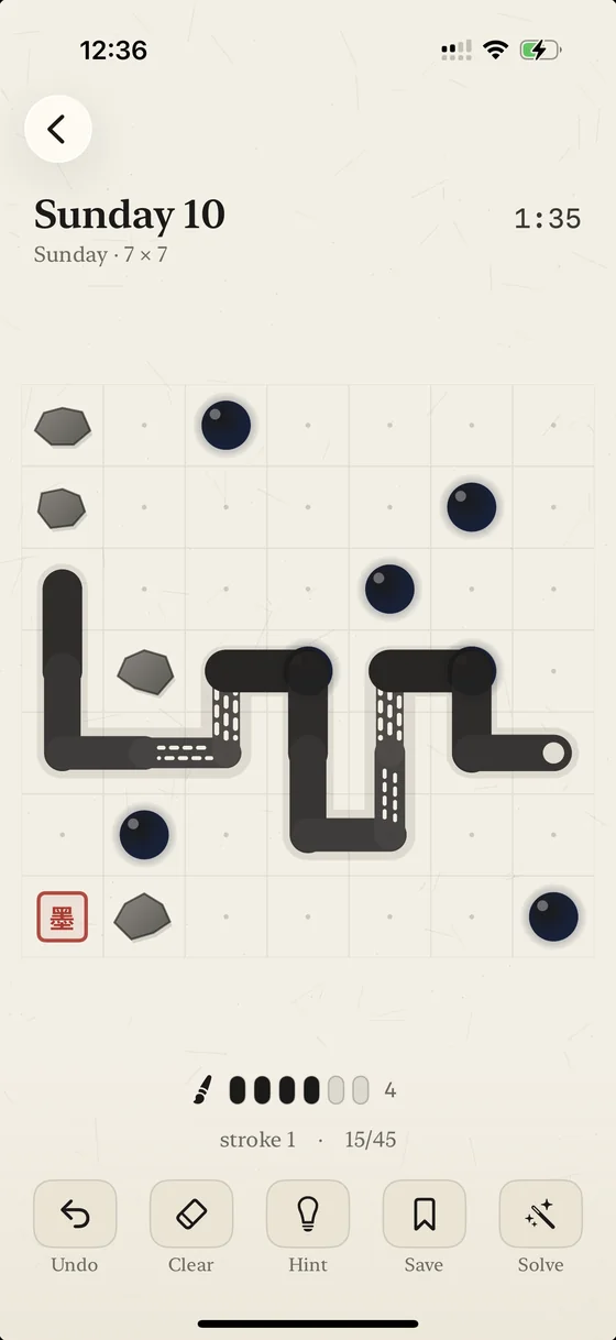 kasure's sunday puzzle, 7 × 7 — one black ink stroke winding through the grid past grey stones and ink pools, fraying as the brush runs dry, with the red 墨 seal waiting in the corner.